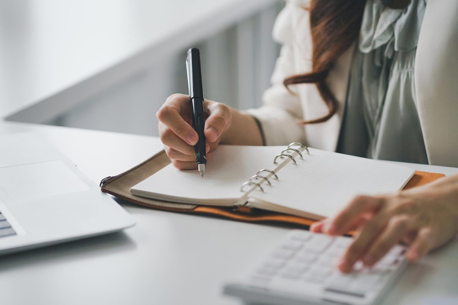 TheWeekly MoneyCash flow management routine Woman practicing cash flow management for solopreneurs with a weekly money check
