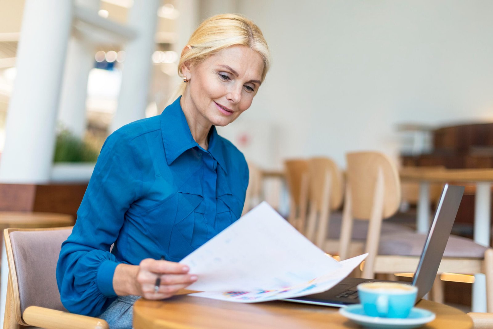 Woman completing a business audit small business owner style, one page, weekend
